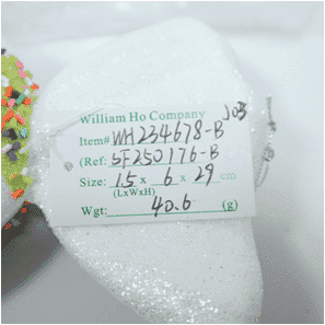 Adorno de caramelito con destellos verdes y multicolores