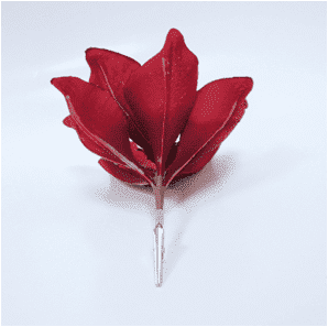 Clip de flor de pascua navideño en tono rojo con destellos dorados.