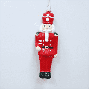 Adorno colgante navideño de cascanueces con traje rojo adorable.