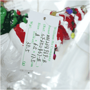 Adorno colgante del Papá Noel guiño travieso con luces de colores